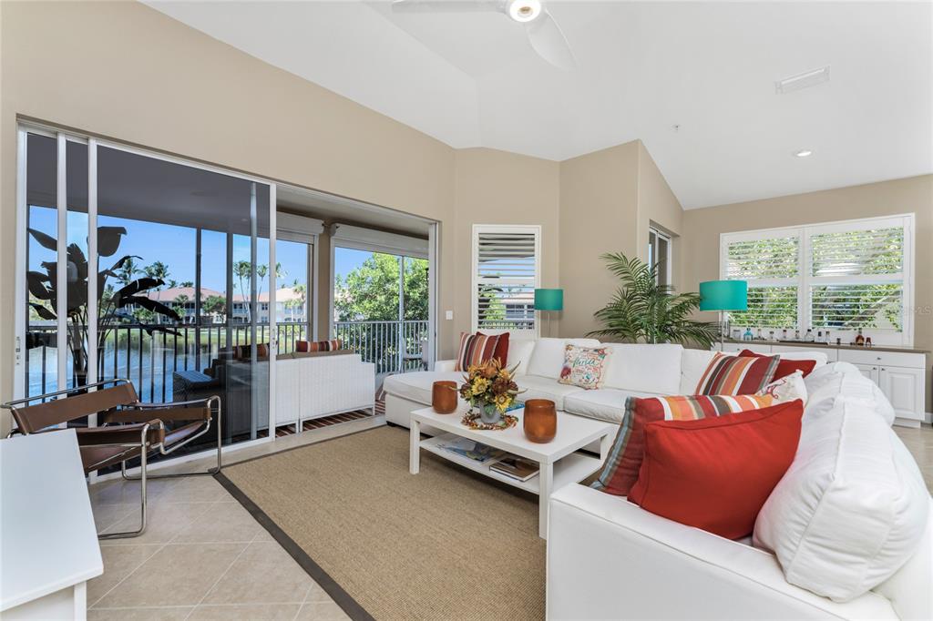 3316 Sunset Key Circle, Unit D Punta Gorda, FL 33955 - Photo 6 of 68 a living room with furniture and a large window