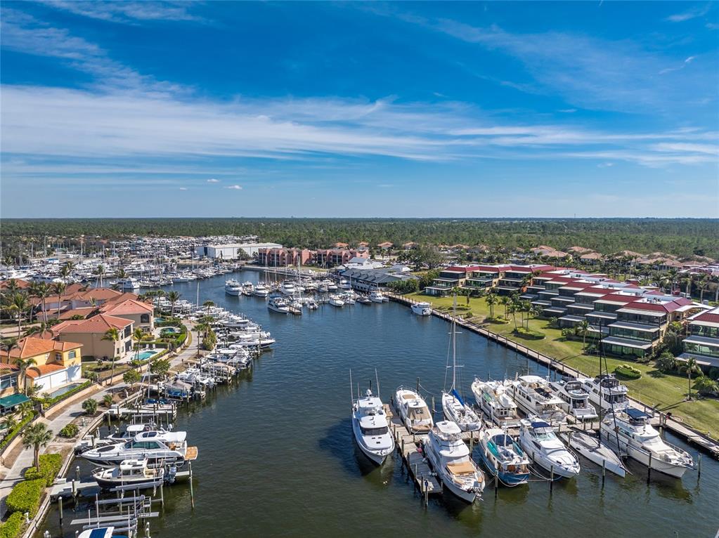 3316 Sunset Key Circle, Unit D Punta Gorda, FL 33955 - Photo 62 of 68 a view of a lake with a nearby beach