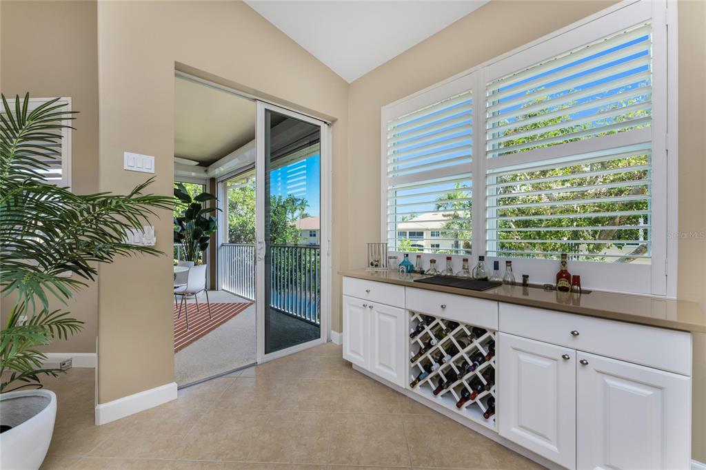 3316 Sunset Key Circle, Unit D Punta Gorda, FL 33955 - Photo 7 of 68 a very nice looking room with a large window and kitchen view