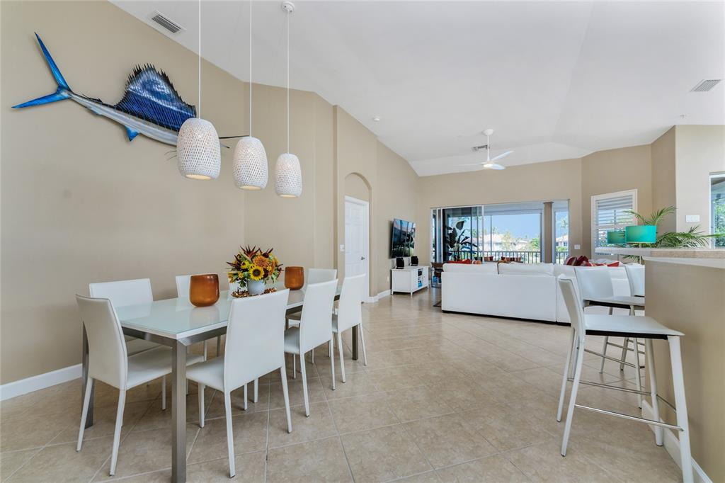 3316 Sunset Key Circle, Unit D Punta Gorda, FL 33955 - Photo 9 of 68 a living room with furniture and a table