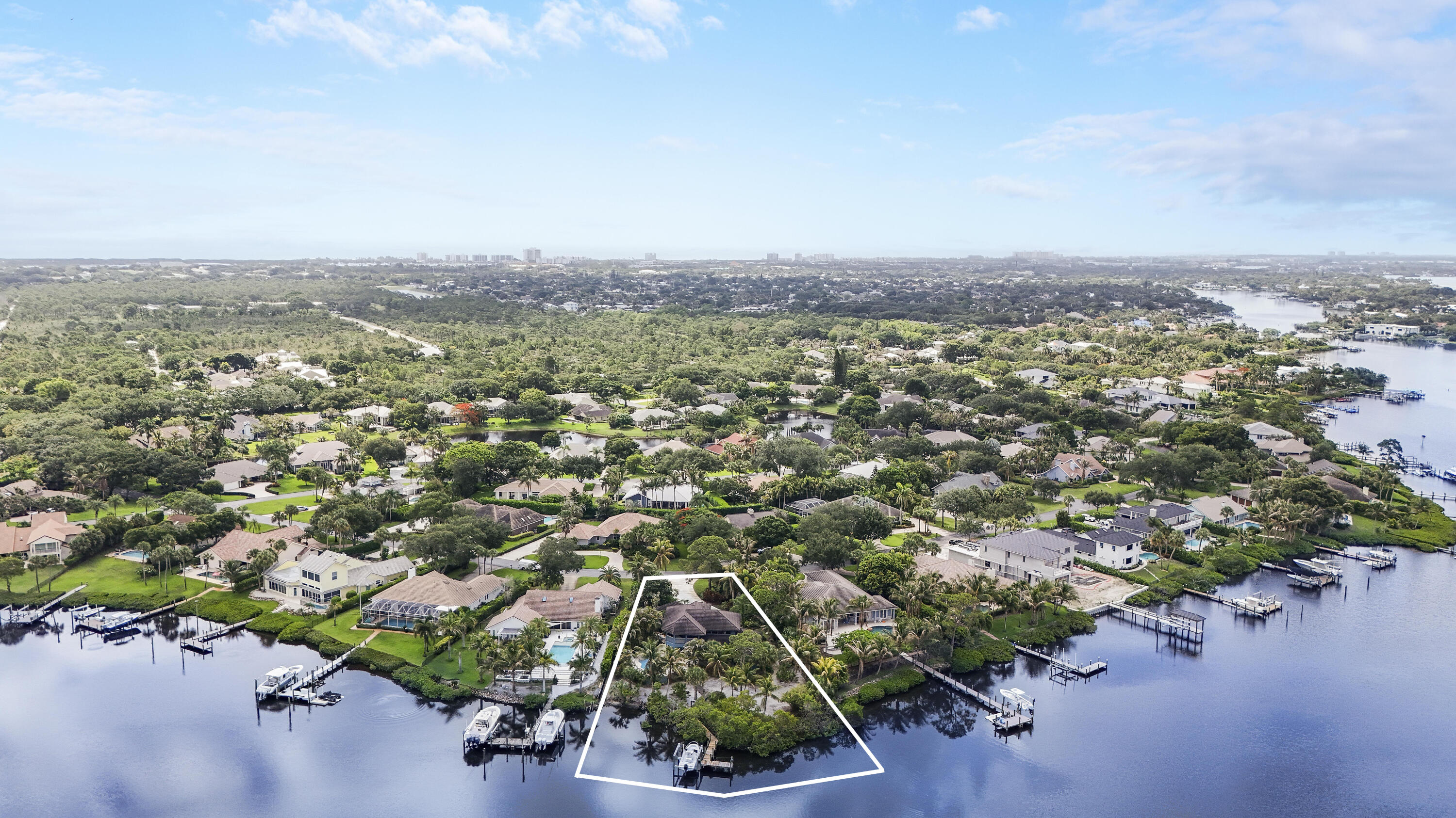 18791 Southeast River Ridge Road Jupiter, FL 33469 - Photo 1 of 25 an aerial view of a city