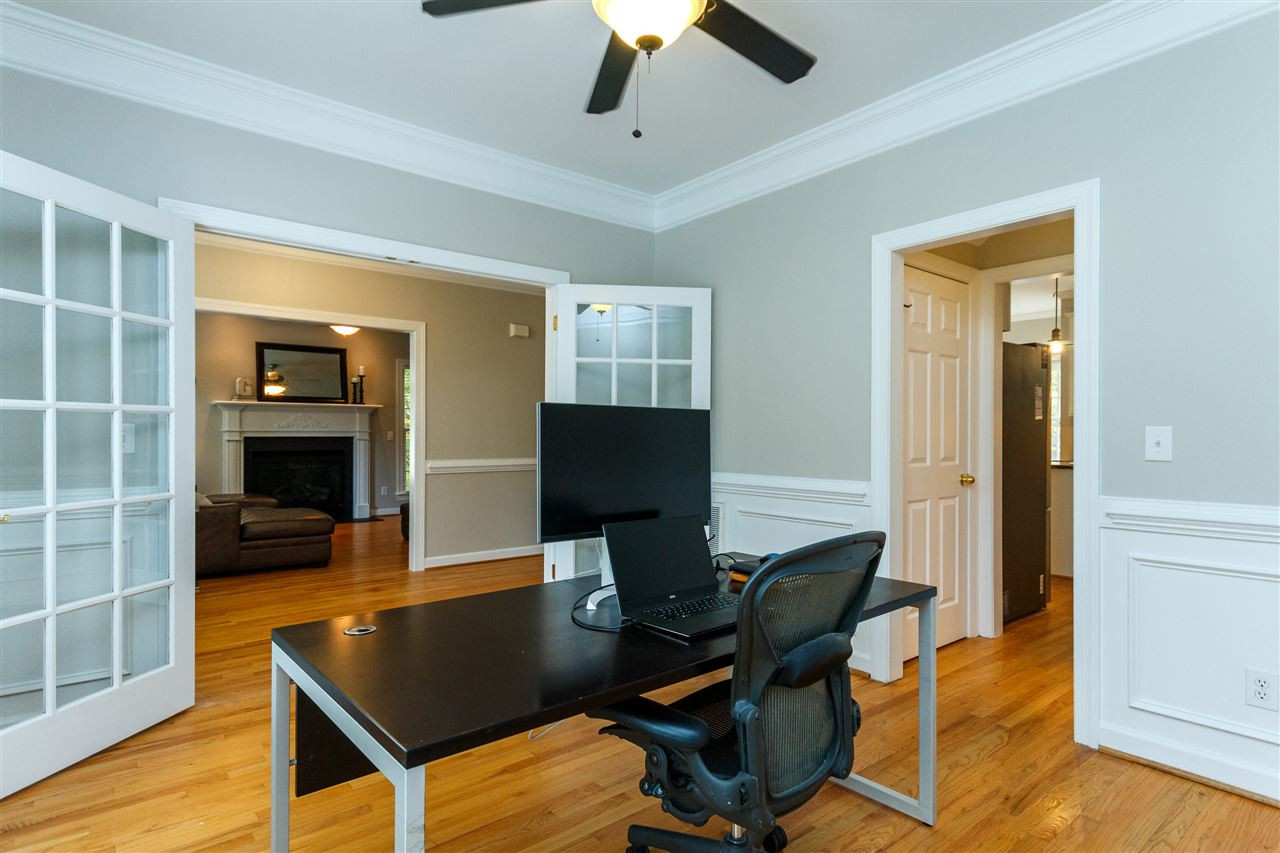 2936 Sunnystone Way Raleigh, NC 27613 - Photo 9 of 29 Formal Dining room currently set up as a office but doors can be removed and converted back to a dining room easily. Formal Dining room