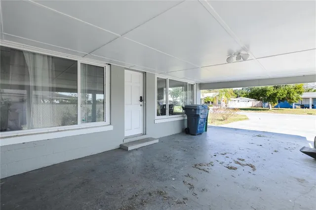 a view of livingroom with furniture and floor to ceiling window