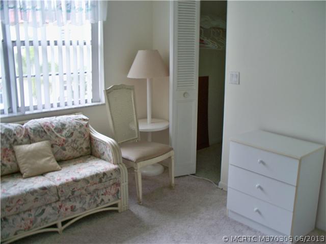 1977 Southwest Palm City Road, Unit 40F Stuart, FL 34994 - Photo 21 of 25 Other. 2nd bedroom with walk-in closet
