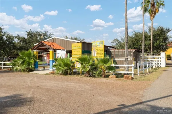 a view of a house with a park