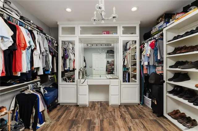 a bathroom with a double vanity sink and mirror