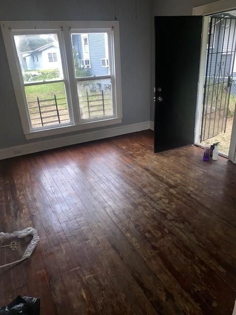 2539 Merwin Street Shreveport, LA 71103 - Photo 7 of 11 Empty room with dark hardwood / wood-style flooring