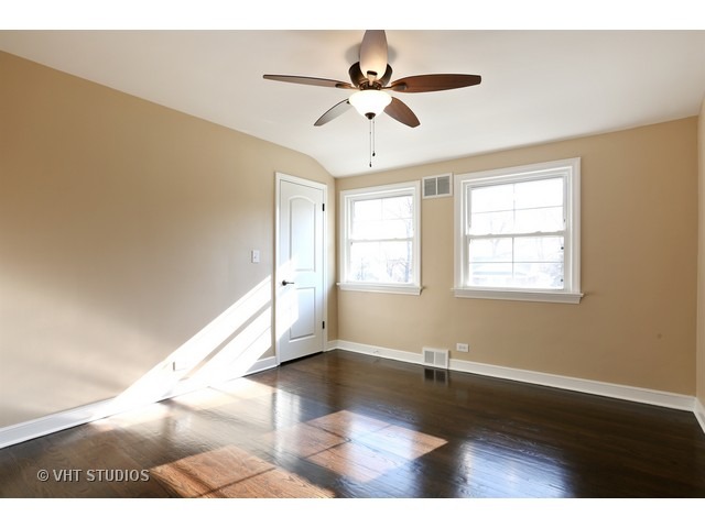 570 Byrd Road Riverside, IL 60546 - Photo 11 of 16 a view of an empty room with a window