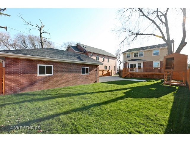 570 Byrd Road Riverside, IL 60546 - Photo 15 of 16 a front view of a house with a yard