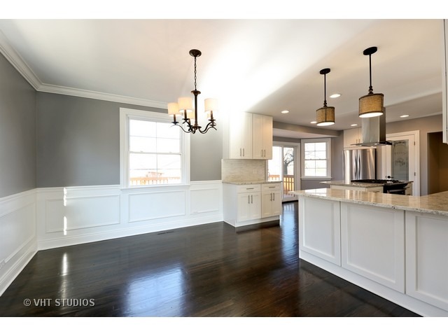 570 Byrd Road Riverside, IL 60546 - Photo 5 of 16 a view of a kitchen with a sink a window and appliances