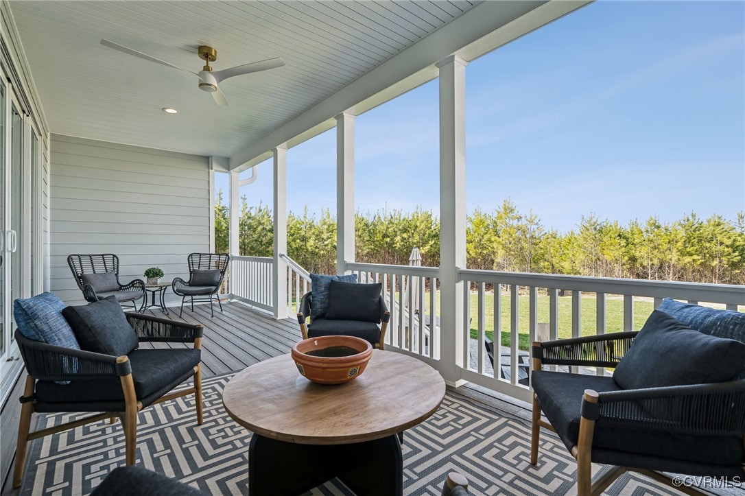 16873 Watchman Way Beaverdam, VA 23015 - Photo 32 of 40 a living room with furniture and a floor to ceiling window