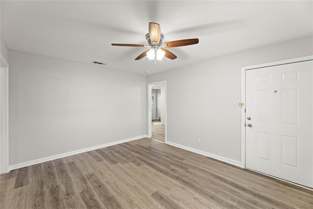 1406 Ridgeview Street Mesquite, TX 75149 - Photo 4 of 16 wooden floor in an empty room