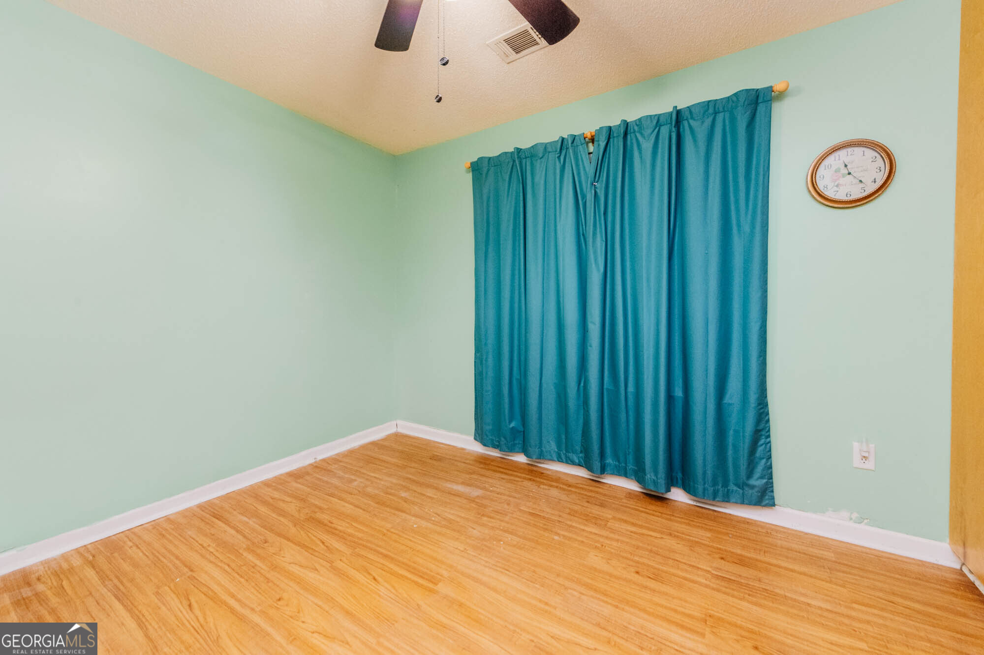 525 Hardison Church Road Byron, GA 31008 - Photo 19 of 32 a view of a room with a wooden wall
