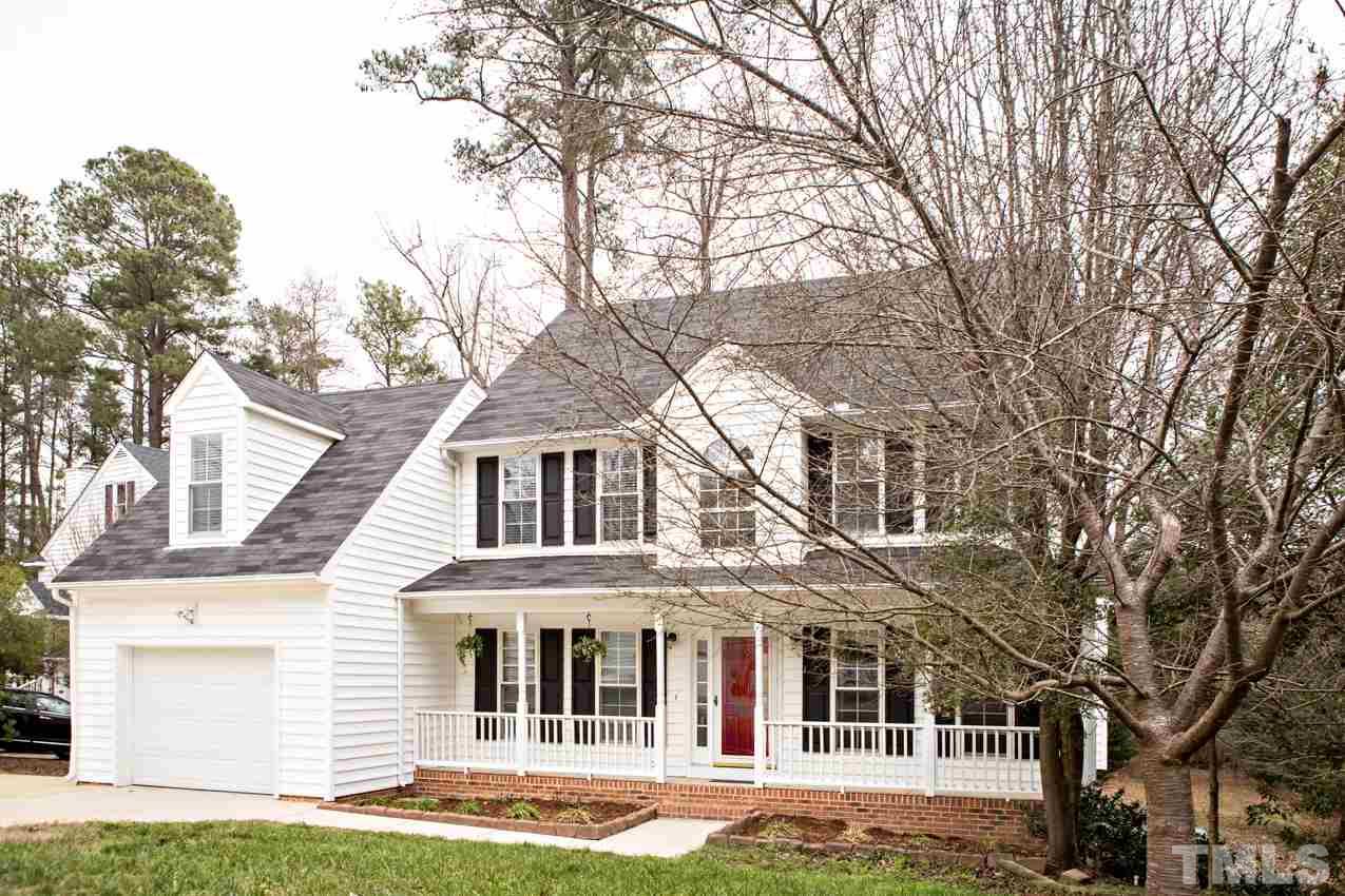9108 Castleton Lane Raleigh, NC 27615 - Photo 1 of 25 front view of a house with a yard