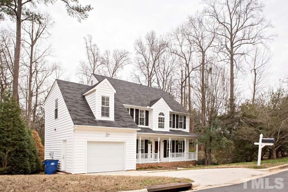 9108 Castleton Lane Raleigh, NC 27615 - Photo 2 of 25 a front view of a house with a yard