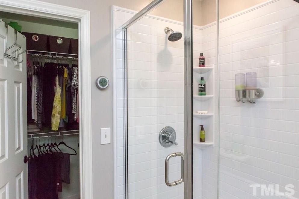 9108 Castleton Lane Raleigh, NC 27615 - Photo 16 of 25 a bathroom with a shower