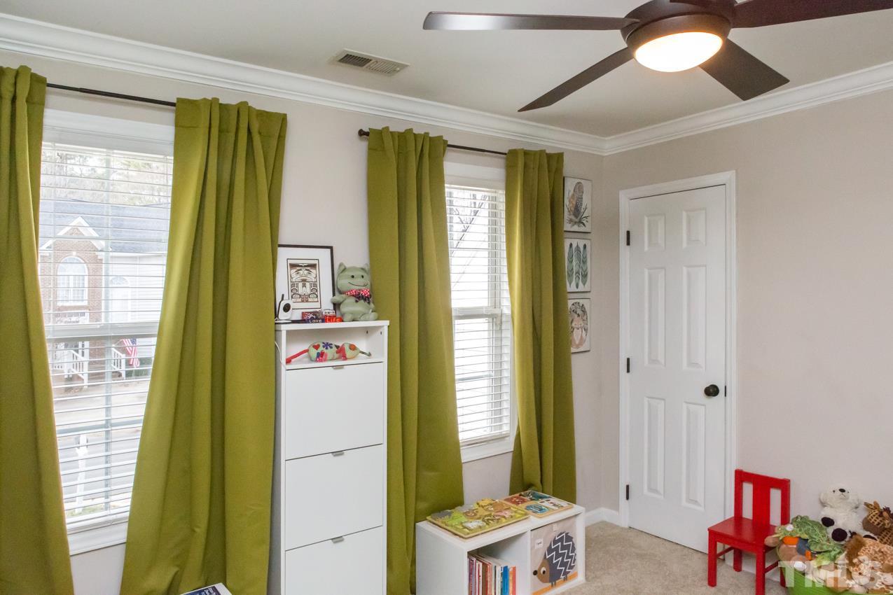 9108 Castleton Lane Raleigh, NC 27615 - Photo 22 of 25 a entryway with furniture and a large window