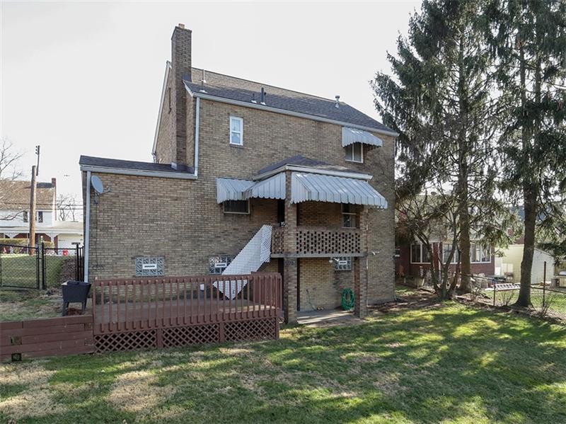 336 Highland Road Pittsburgh, PA 15235 - Photo 21 of 25 Back of Home, rear deck and covered patio off of the kitchen area