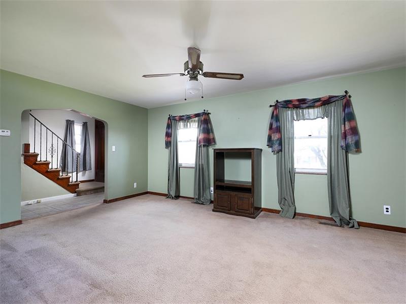 336 Highland Road Pittsburgh, PA 15235 - Photo 4 of 25 Living Room, Hardwood flooring under the carpets.