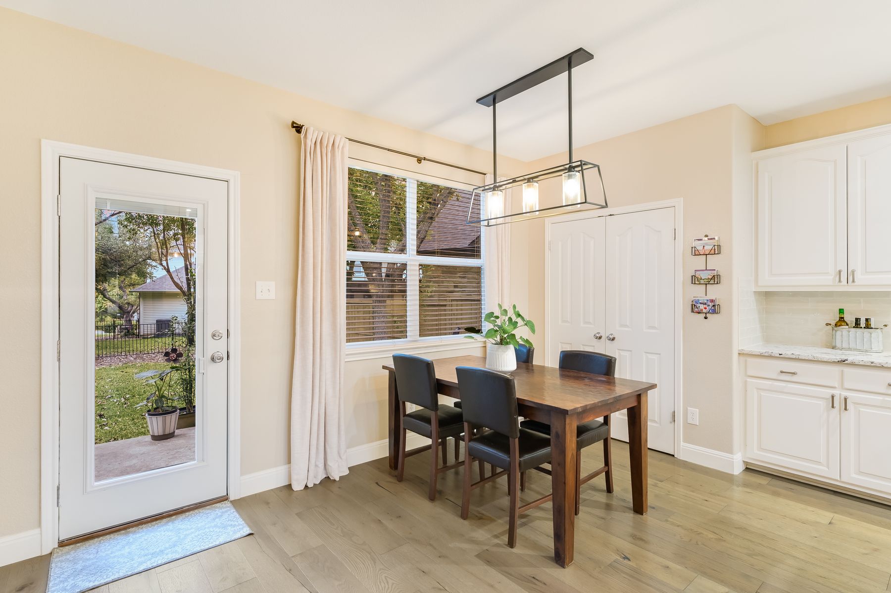 300 River Ridge Drive Georgetown, TX 78628 - Photo 12 of 32 Dining space with light wood-type flooring and baseboards