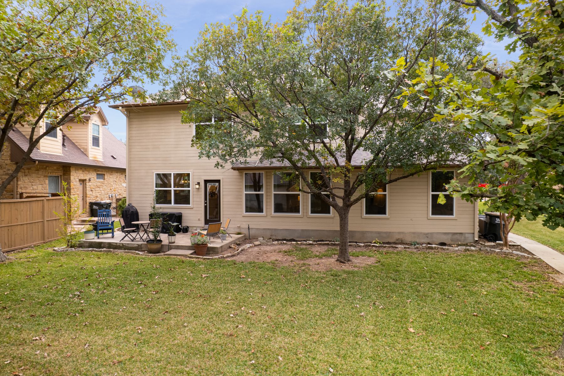 300 River Ridge Drive Georgetown, TX 78628 - Photo 23 of 32 Back of property with a patio