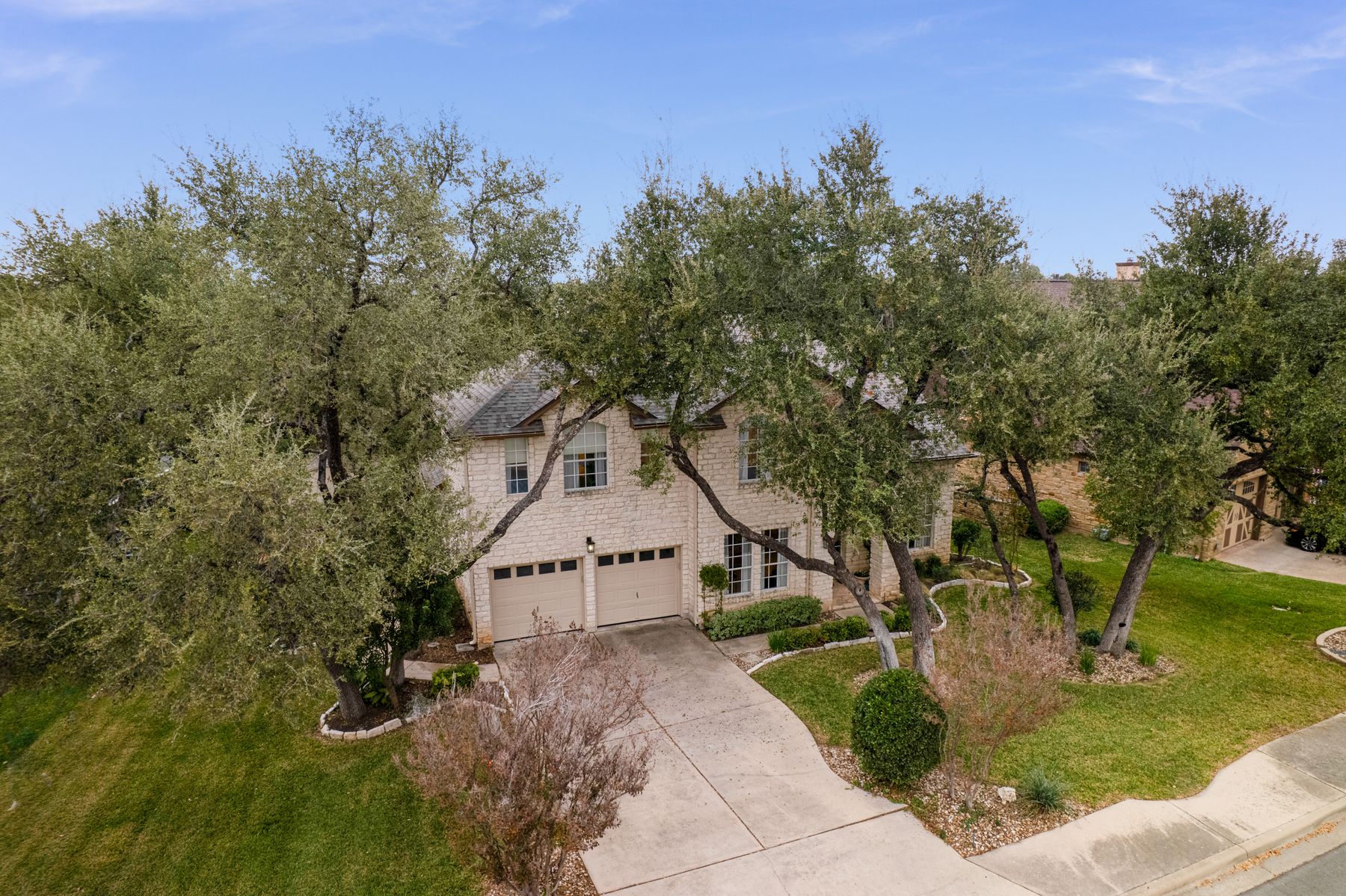 300 River Ridge Drive Georgetown, TX 78628 - Photo 31 of 32 Traditional-style house featuring a front yard, concrete driveway, and an attached garage