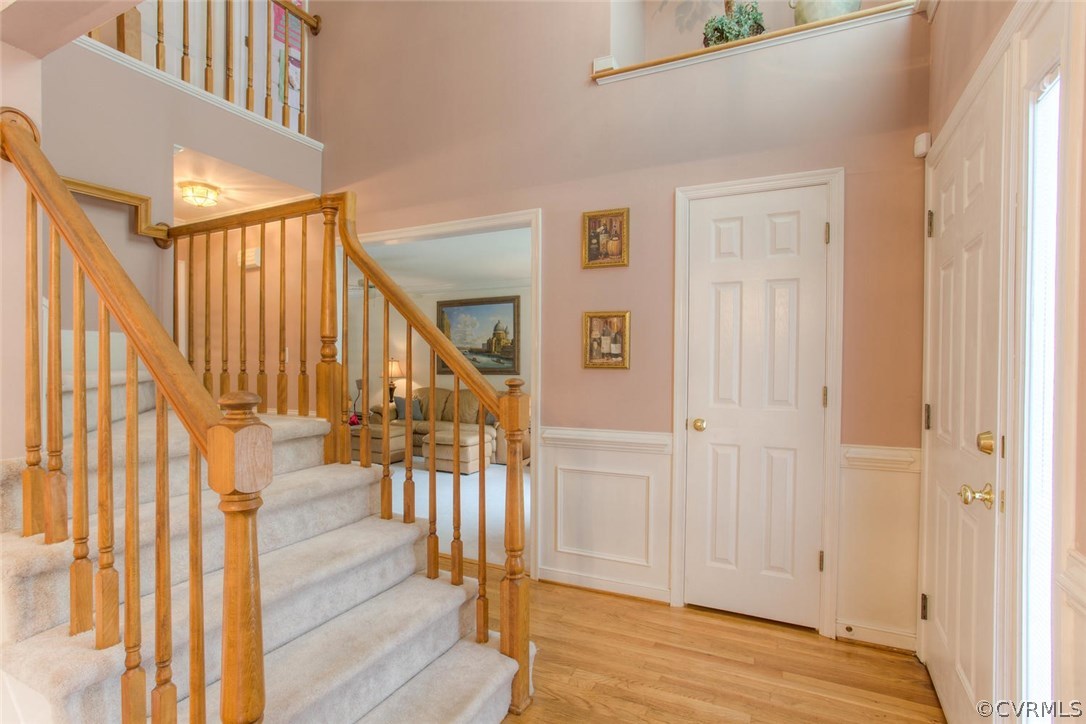 5501 Windy Ridge Court Midlothian, VA 23112 - Photo 3 of 31 a view of a hallway with wooden floor and entryway