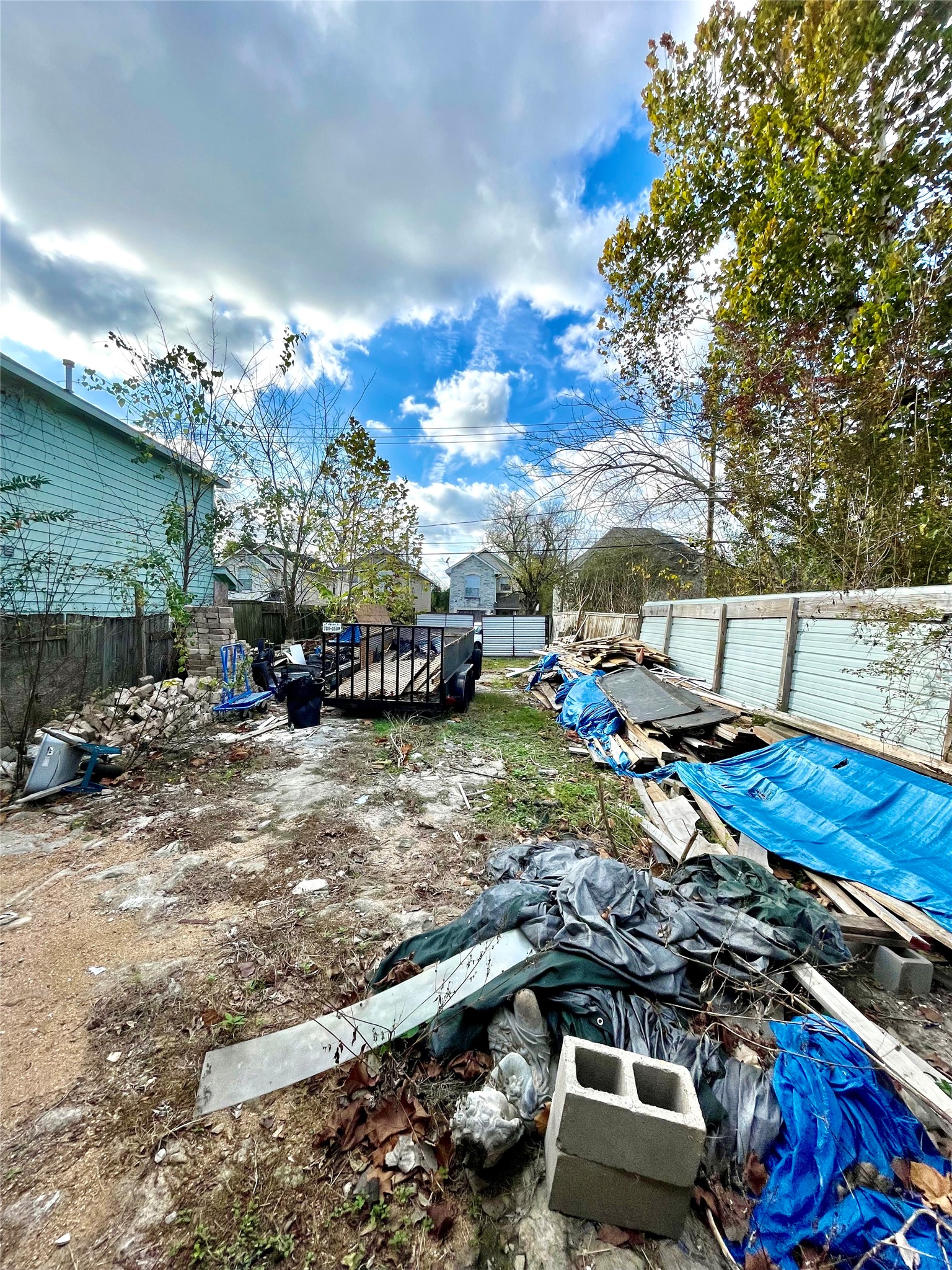 6908 Apollo Street Houston, TX 77091 - Photo 3 of 7 a view of a yard with furniture