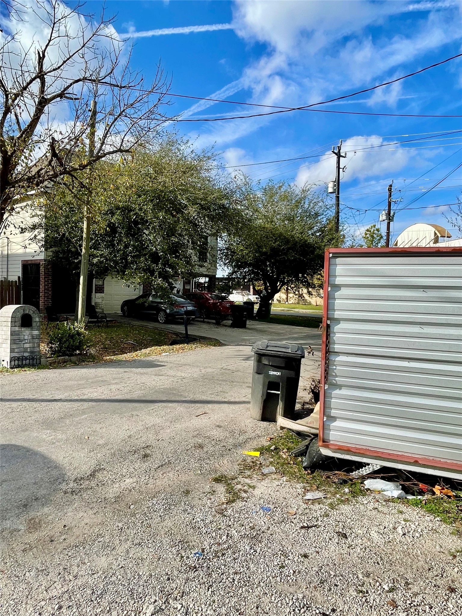 6908 Apollo Street Houston, TX 77091 - Photo 6 of 7 a view of a house with a yard