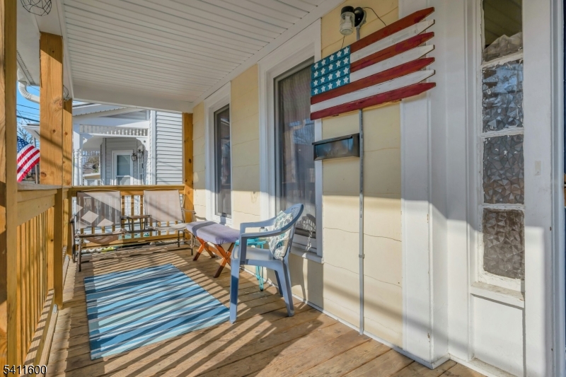 6 Madison Street Newton, NJ 07860 - Photo 11 of 28 a balcony with table and chairs