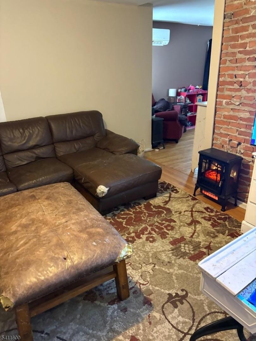 6 Madison Street Newton, NJ 07860 - Photo 3 of 28 a living room with furniture