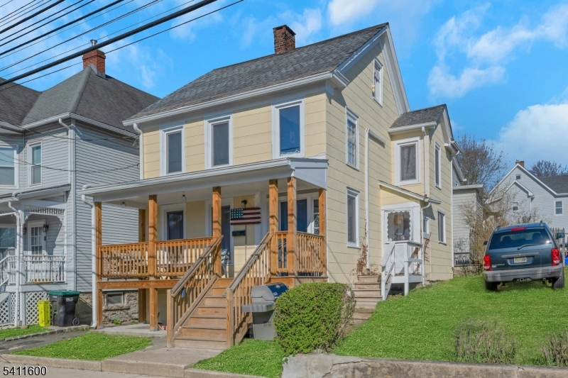 6 Madison Street Newton, NJ 07860 - Photo 9 of 28 a front view of a house with a yard
