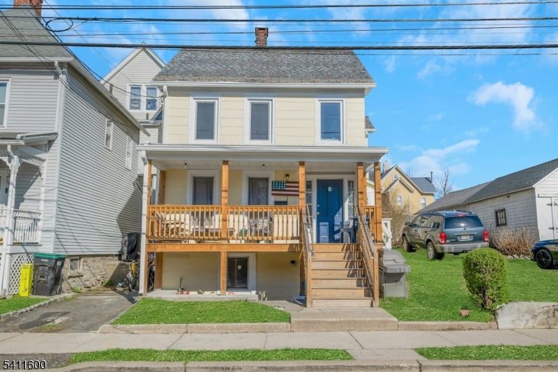 6 Madison Street Newton, NJ 07860 - Photo 10 of 28 a front view of a house with a yard