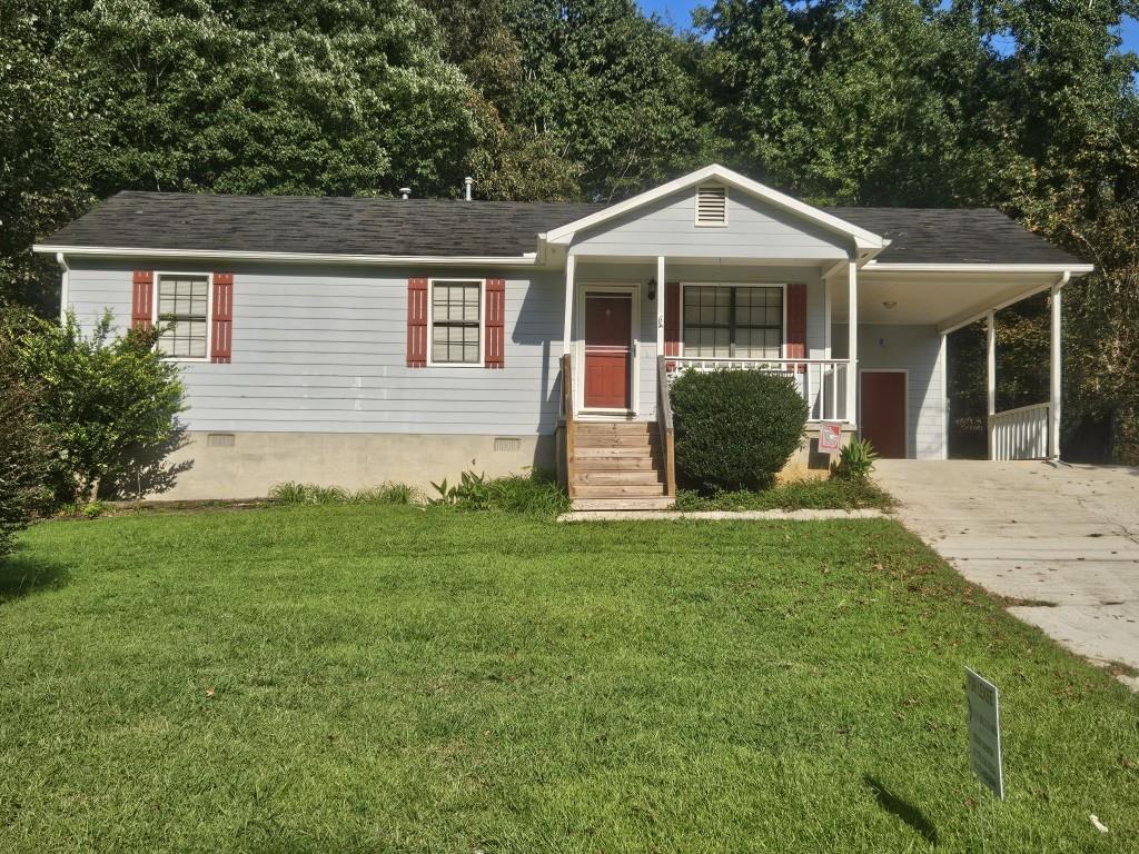 4121 Burgundy Way Flowery Branch, GA 30542 - Photo 2 of 15 a front view of a house with a garden