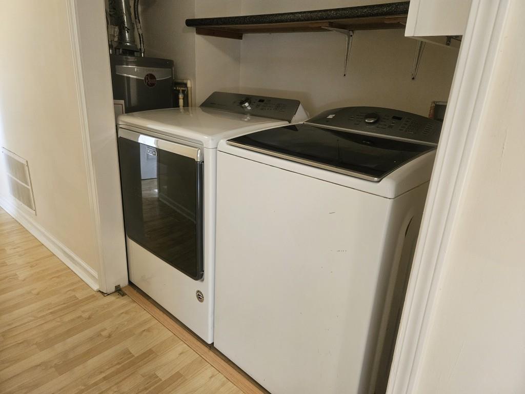 4121 Burgundy Way Flowery Branch, GA 30542 - Photo 6 of 15 a close up view of washer and dryer