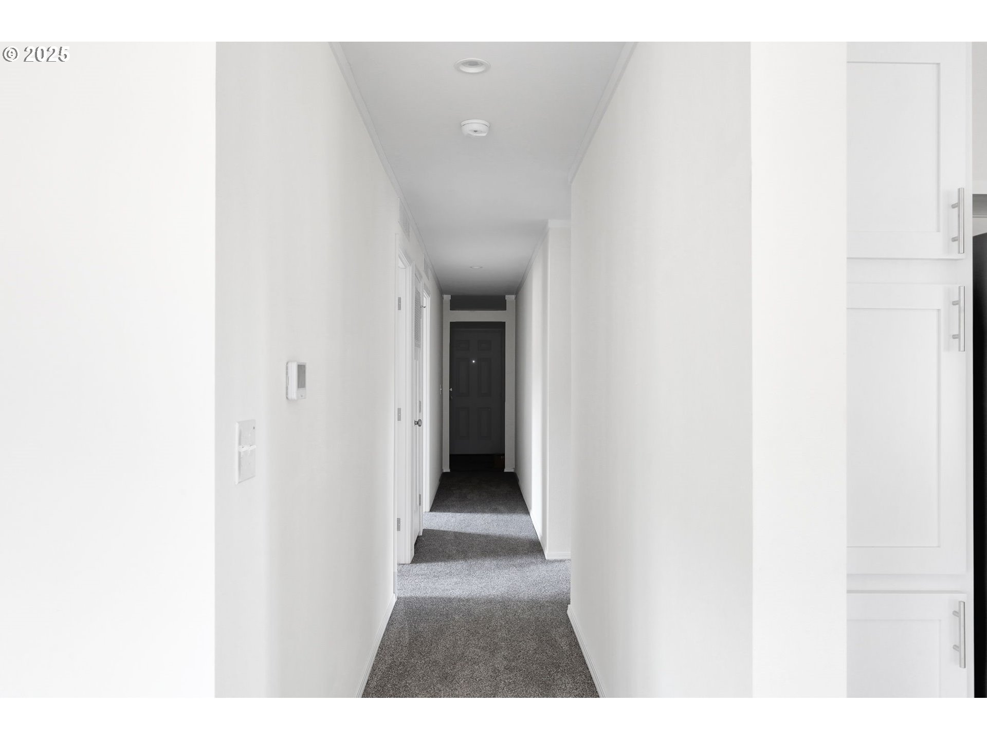 89615 Hill Road Springfield, OR 97478 - Photo 18 of 44 a view of a hallway with wooden floor