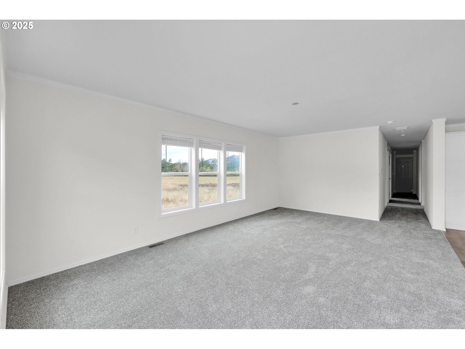 89615 Hill Road Springfield, OR 97478 - Photo 5 of 44 a view of an empty room with a window