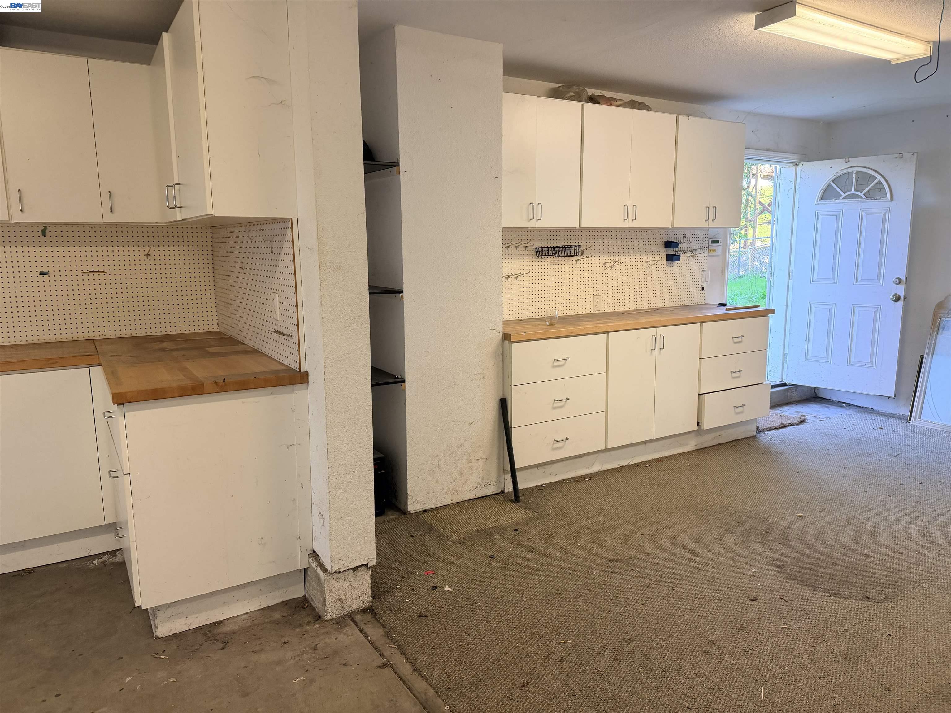 4526 Windsweep Road Bethel Island, CA 94511 - Photo 27 of 41 a kitchen with cabinets appliances a sink and a window
