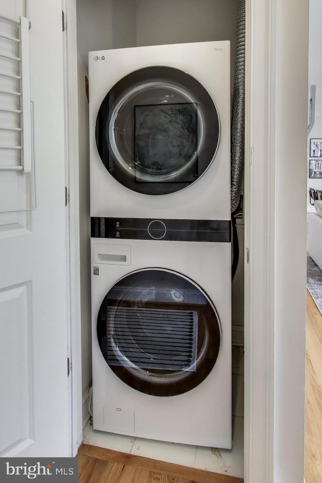 1406 T Street Northwest, Unit 6 Washington, DC 20009 - Photo 16 of 31 a utility room with dryer and washer