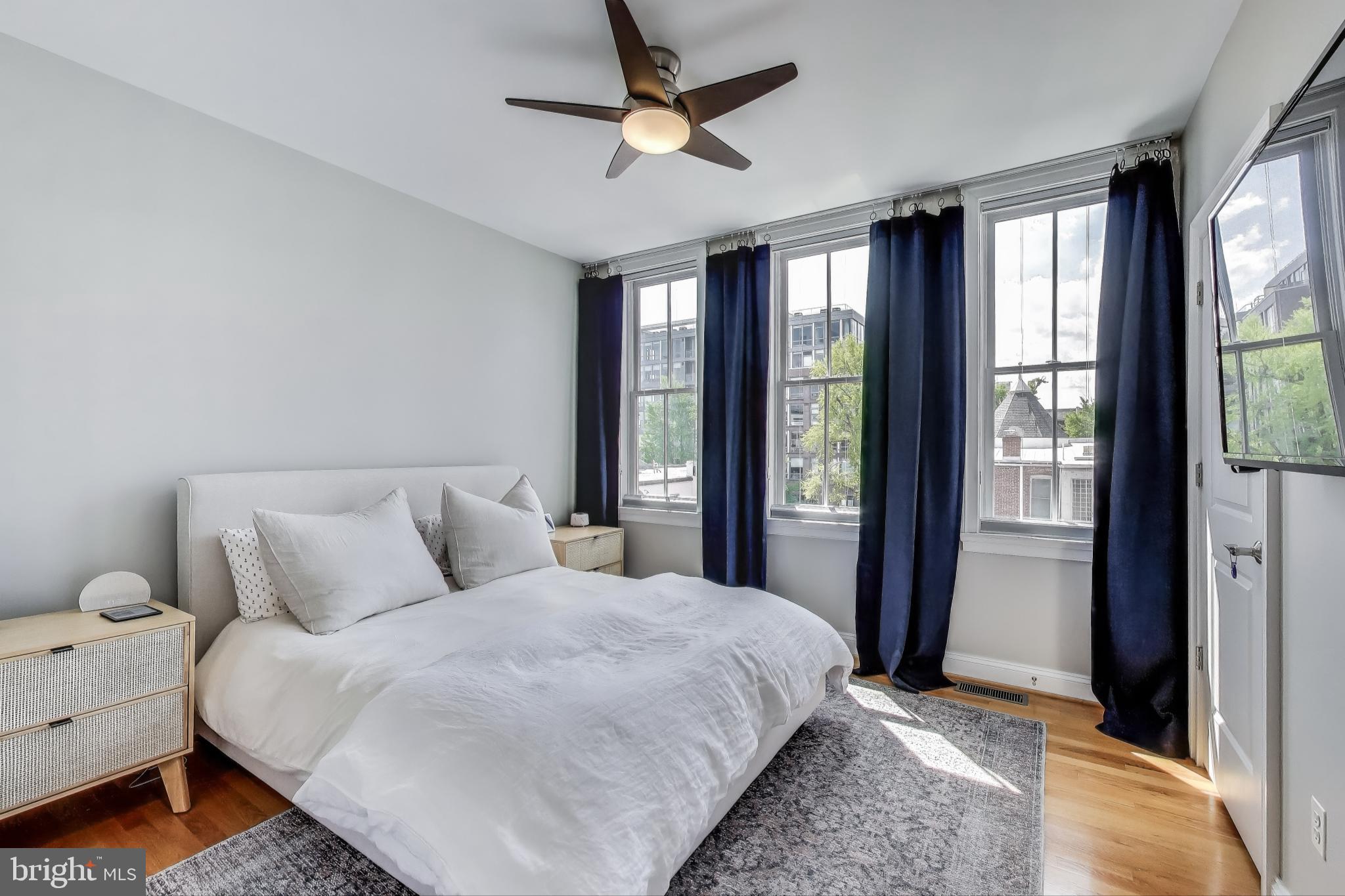 1406 T Street Northwest, Unit 6 Washington, DC 20009 - Photo 19 of 31 a bedroom with a large bed and a large window