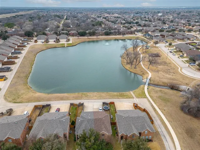 an aerial view of a house with a outdoor space