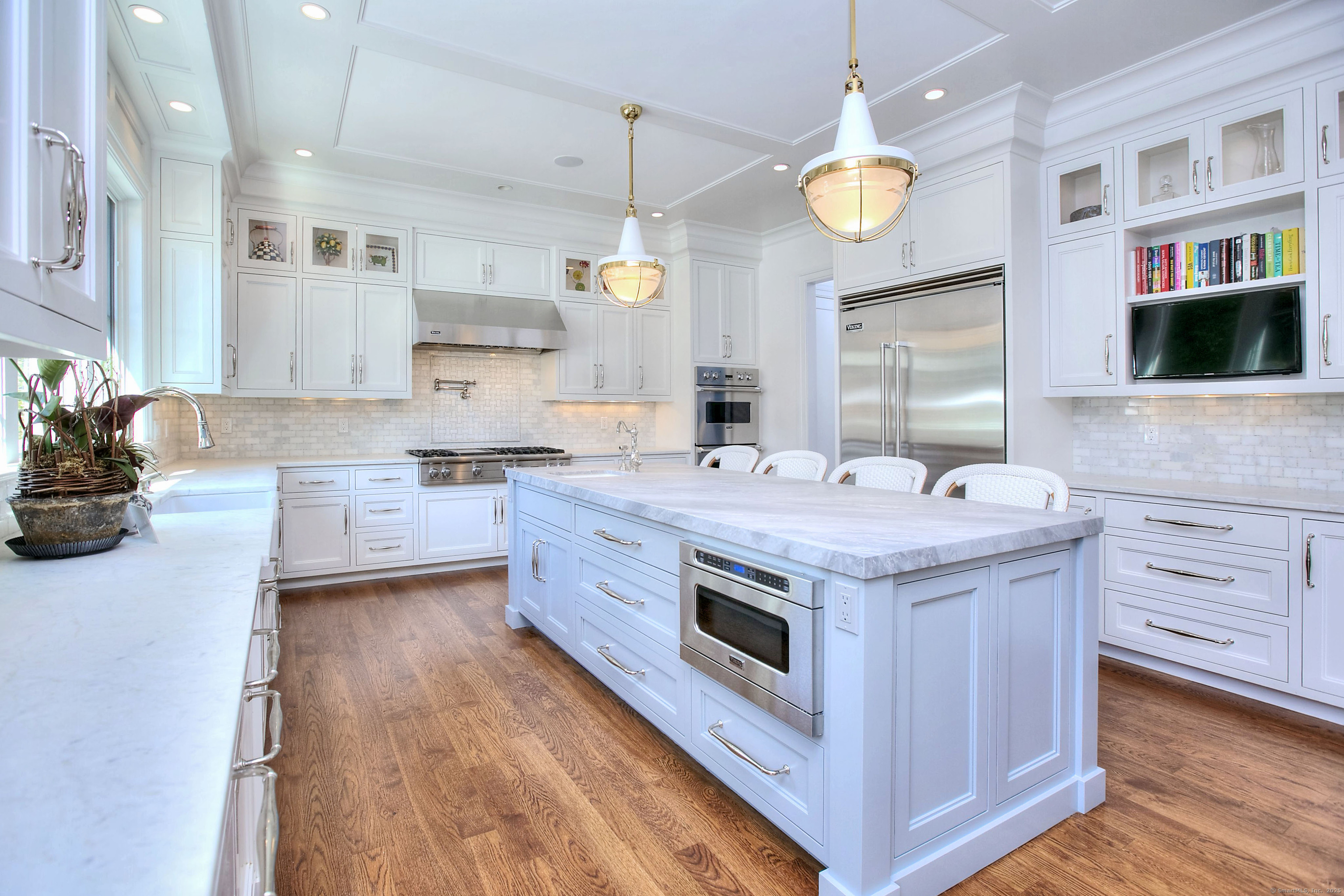 10 Debra Lane Westport, CT 06880 - Photo 21 of 40 a kitchen with a stove and a sink