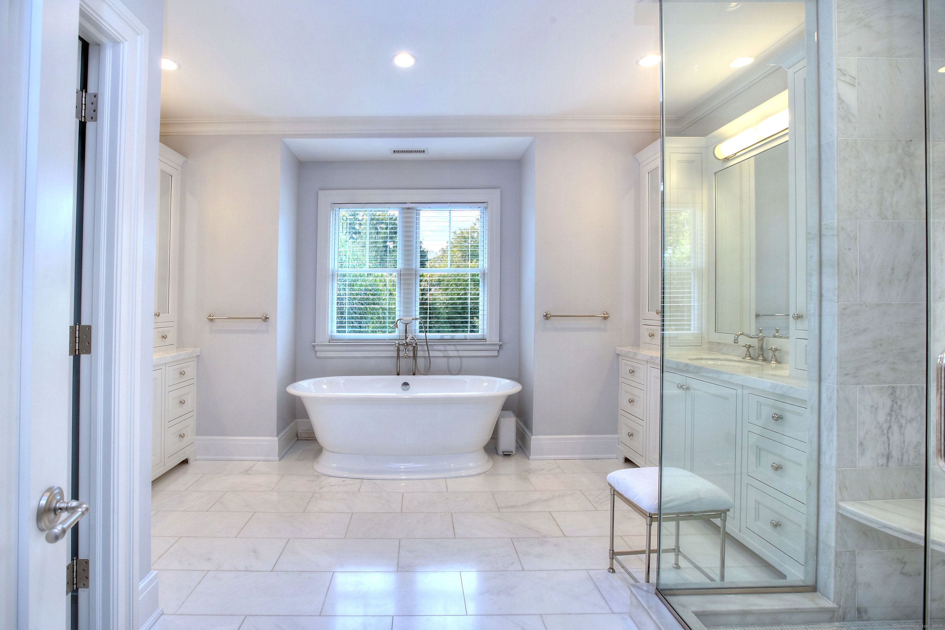 10 Debra Lane Westport, CT 06880 - Photo 24 of 40 a bathroom with a bathtub shower sink and toilet