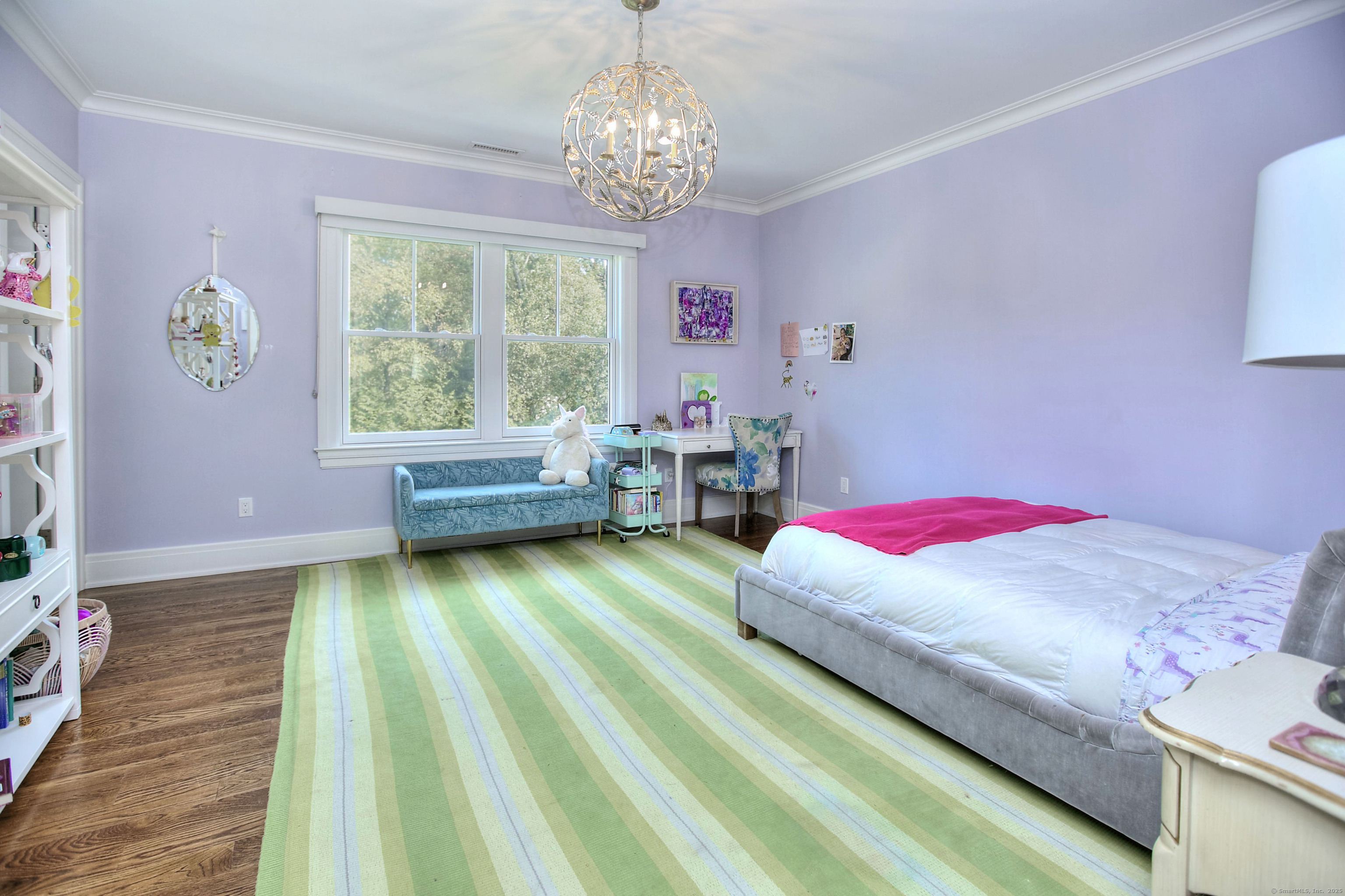 10 Debra Lane Westport, CT 06880 - Photo 28 of 40 a living room with a bed furniture and a window