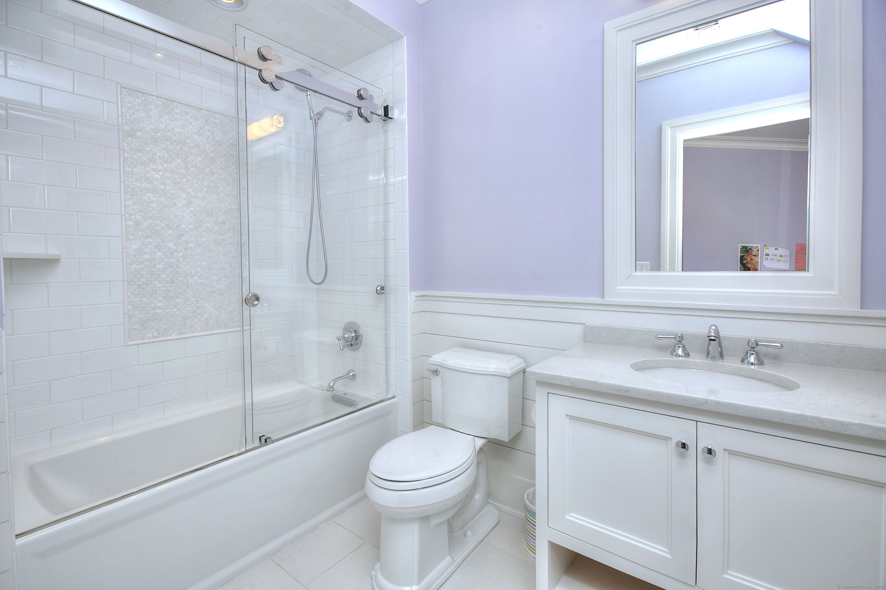 10 Debra Lane Westport, CT 06880 - Photo 29 of 40 a bathroom with a sink a toilet and shower