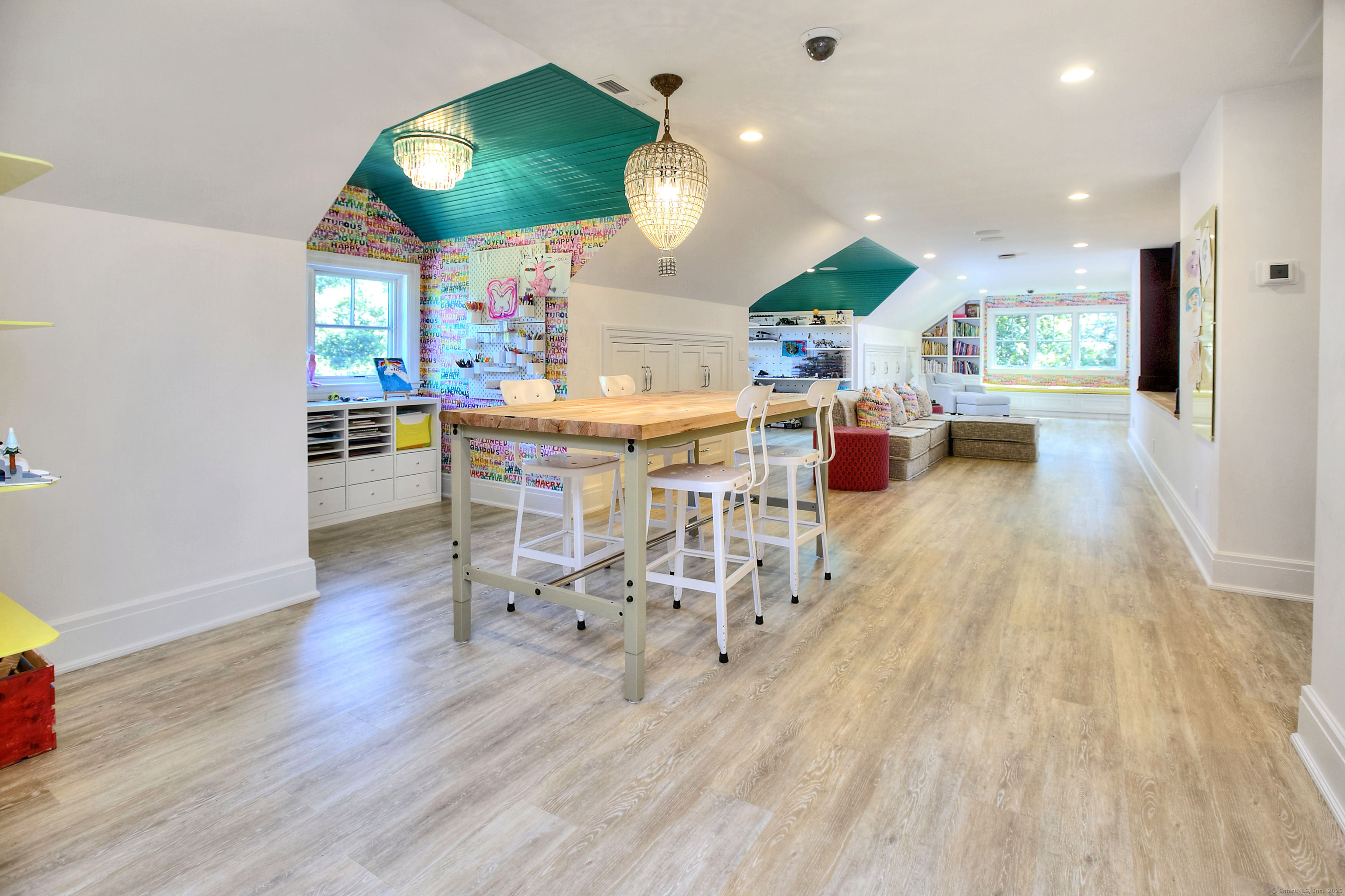 10 Debra Lane Westport, CT 06880 - Photo 33 of 40 an open kitchen with dining table and chairs