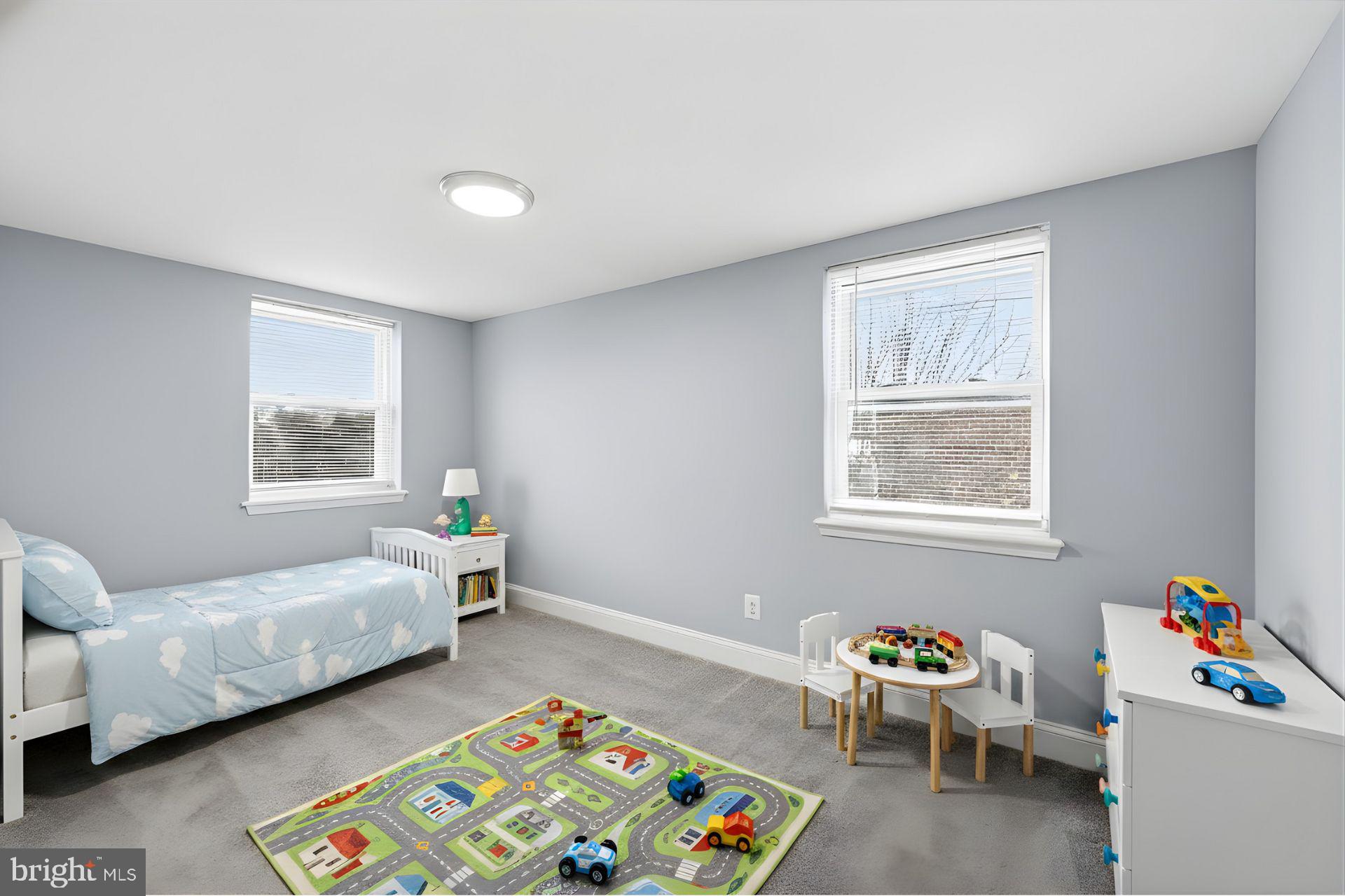 529 Mosher Street Baltimore, MD 21217 - Photo 10 of 12 a room with furniture and a window