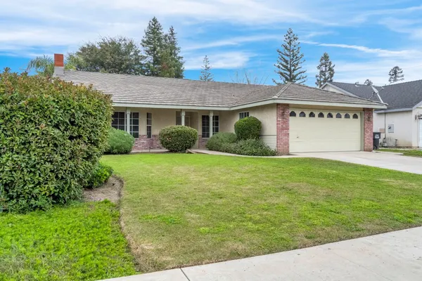 front view of house with a yard