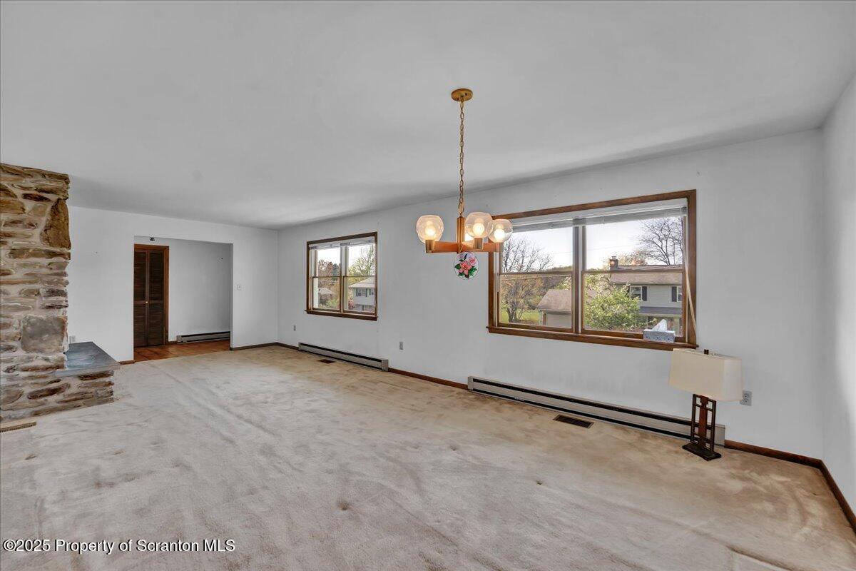906 Violet Terrace Clarks Summit, PA 18411 - Photo 14 of 38 a view of an empty room with a window