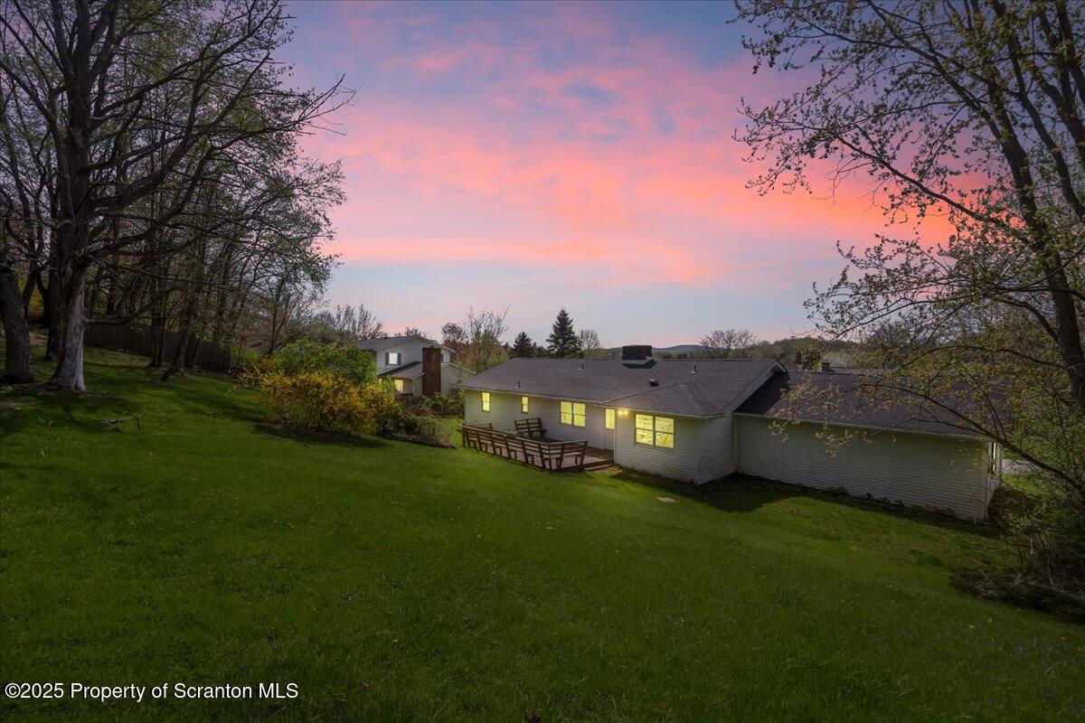906 Violet Terrace Clarks Summit, PA 18411 - Photo 37 of 38 a view of a garden with houses